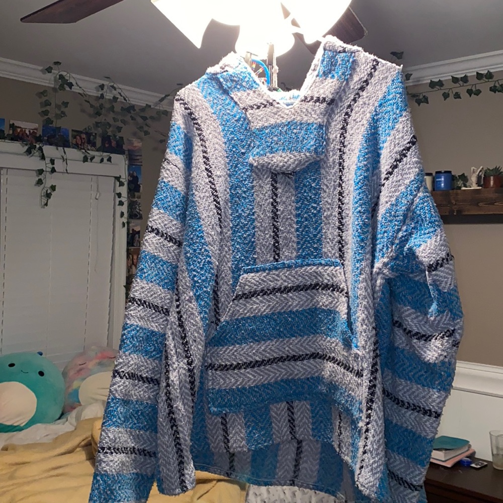 Black, grey, white, and blue Baja hoodie